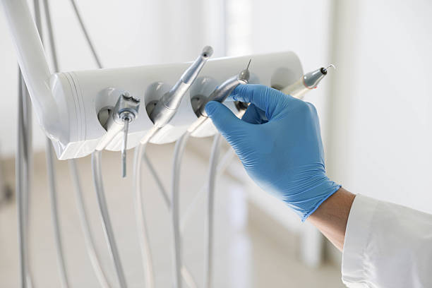 Professional Tooth Extraction technician working in Galveston, TX